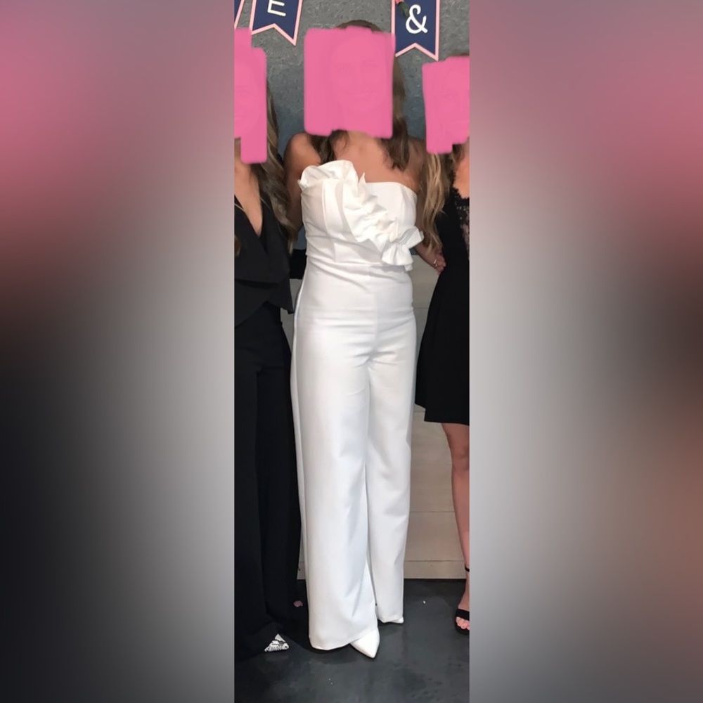 White pantsuit with ruffle